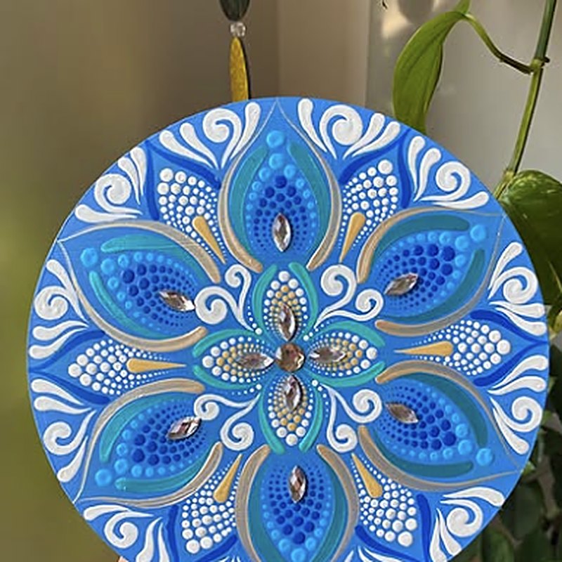 Mandala em pontilhismo nas cores azul e dourado